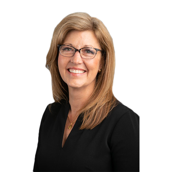 A smiling woman with shoulder-length blonde hair and glasses, wearing a black top, posing against a white background.